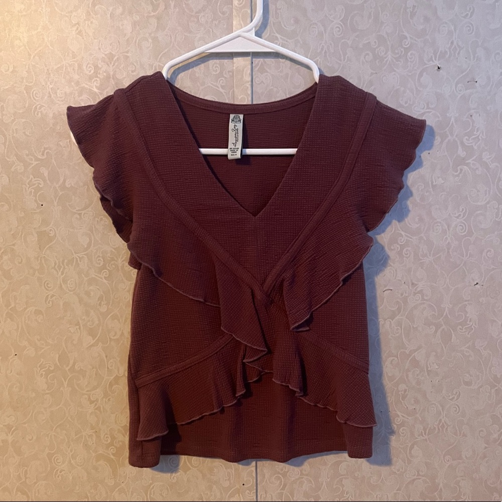 Sleeveless butterfly sleeve layered top